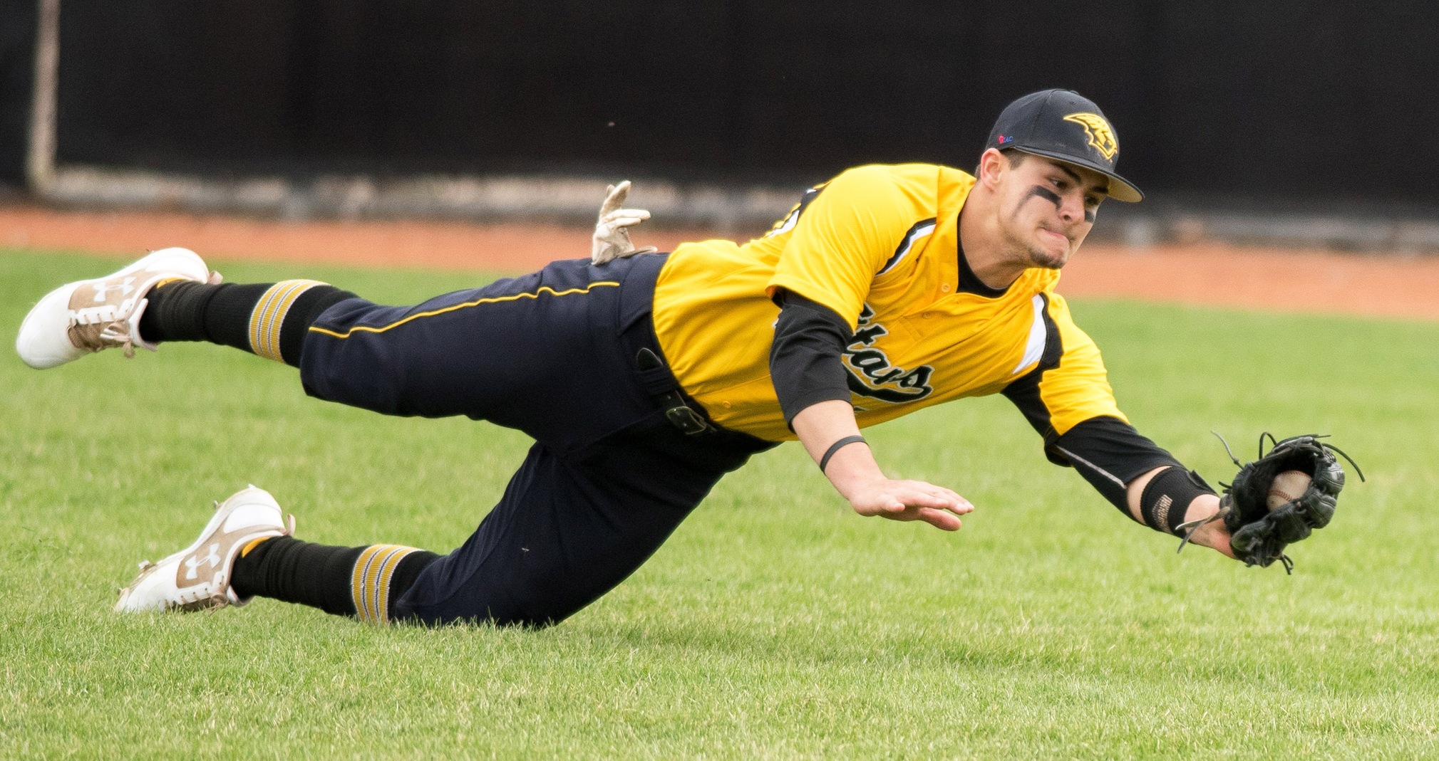 Sam Schwenn recorded 10 putouts during the doubleheader with the Eagles, including this diving catch.