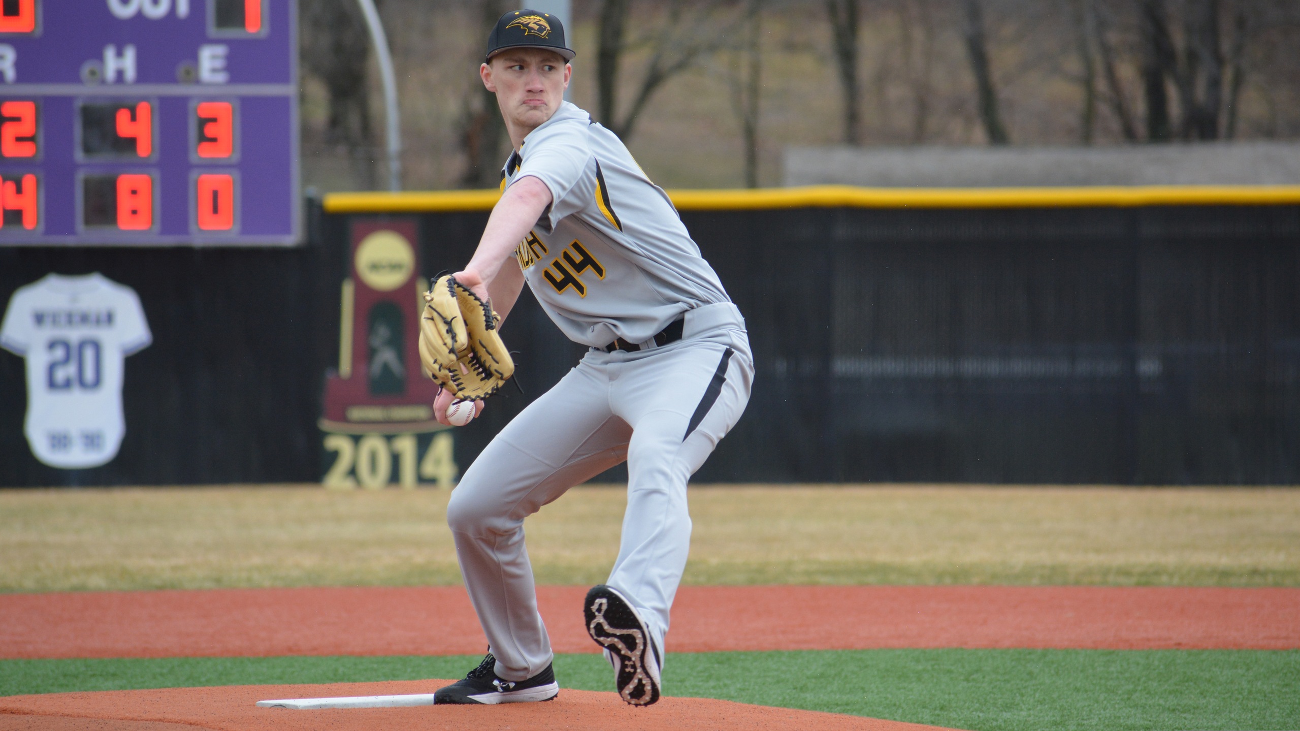 Nick Loizzi pitched a perfect sixth inning in his first appearance as a Titan during the opener.