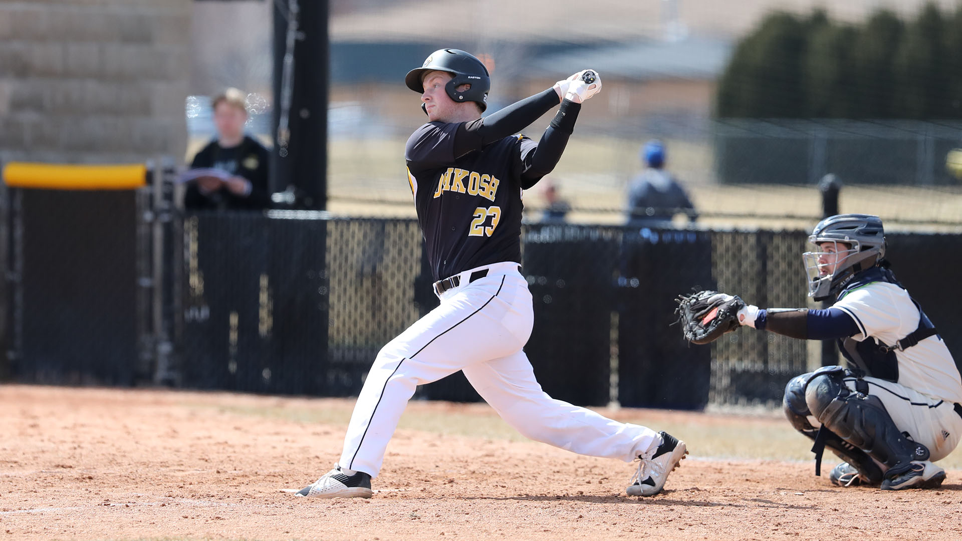 Connor Giusti had two hits during each game against UW-Stevens Point, including a solo home run in the opener.