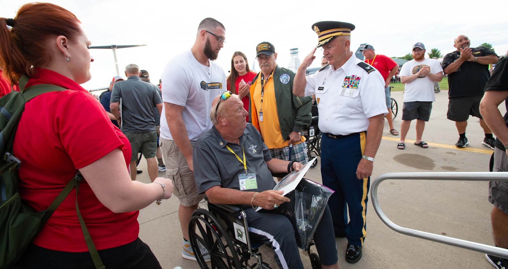Football Team Assists Veterans On Yellow Ribbon Honor Flight