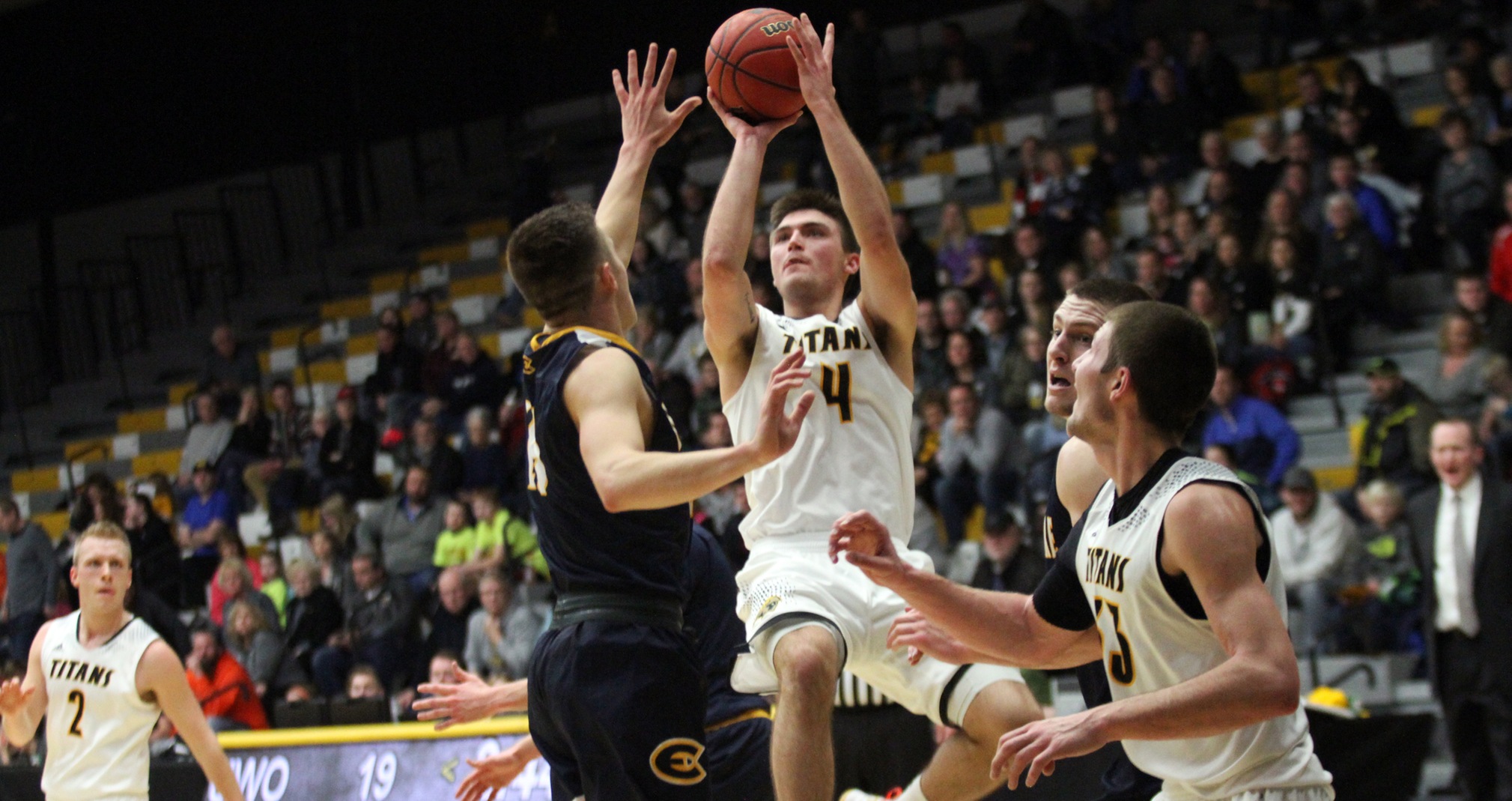 Brett Wittchow's career-high 26 points helped the Titans record a season sweep of the nationally ranked Blugolds.