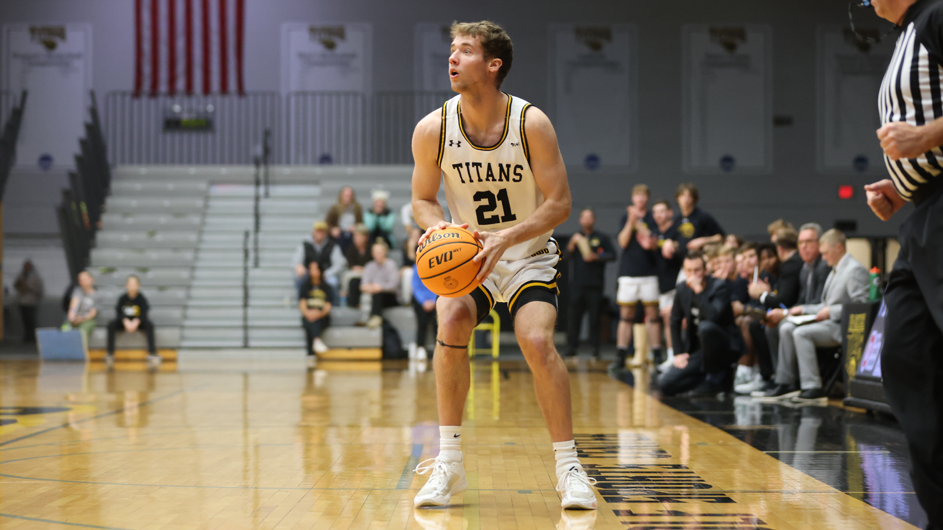 Carter Thomas scored 14 points, going six-of-six from the line in the Titans' loss to Whitman