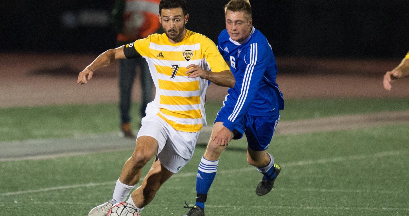 Elias Efthimiou plays the ball up field against the Norse.