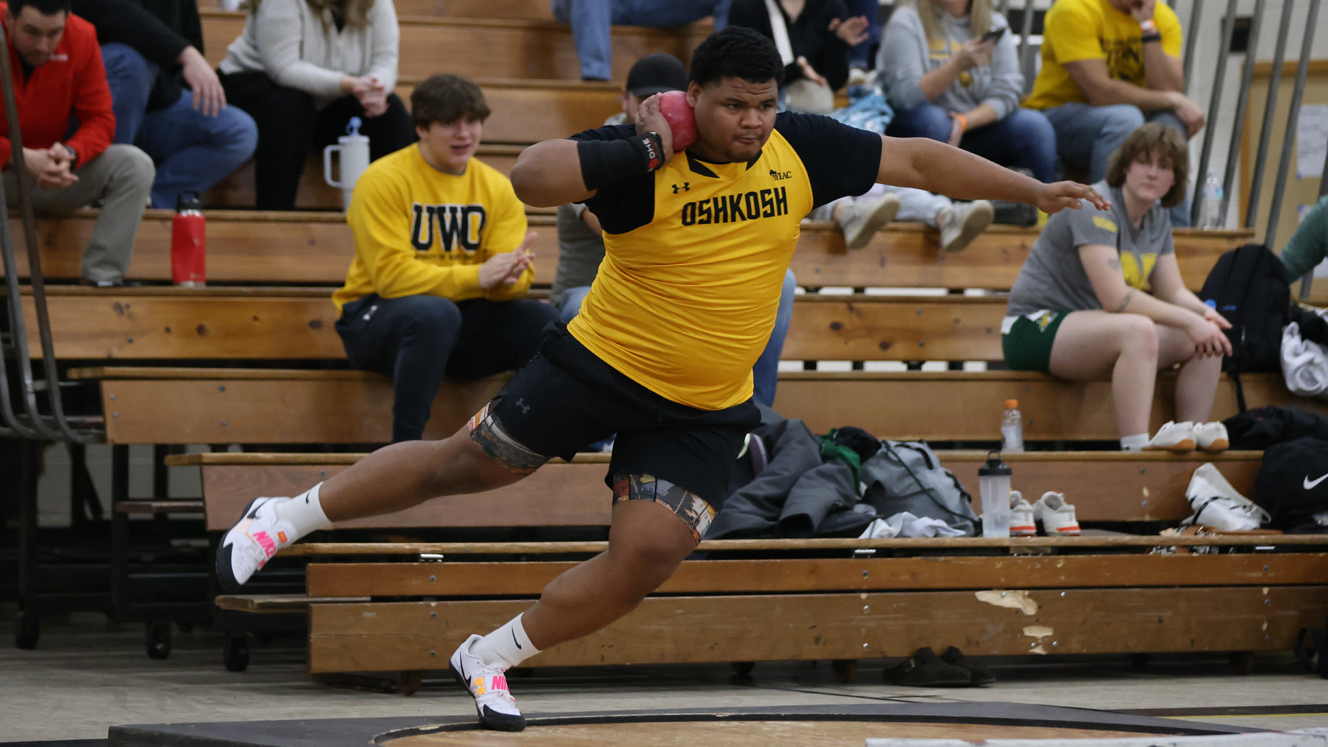 Isaiah Isom won the shot put, helping the Titans finish second at the Karl Schlender Invitational on Saturday