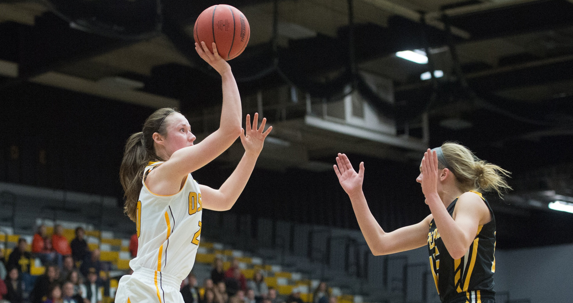 Ashley Neustifter scored 10 points, including a pair of 3-point baskets, against the Yellowjackets.