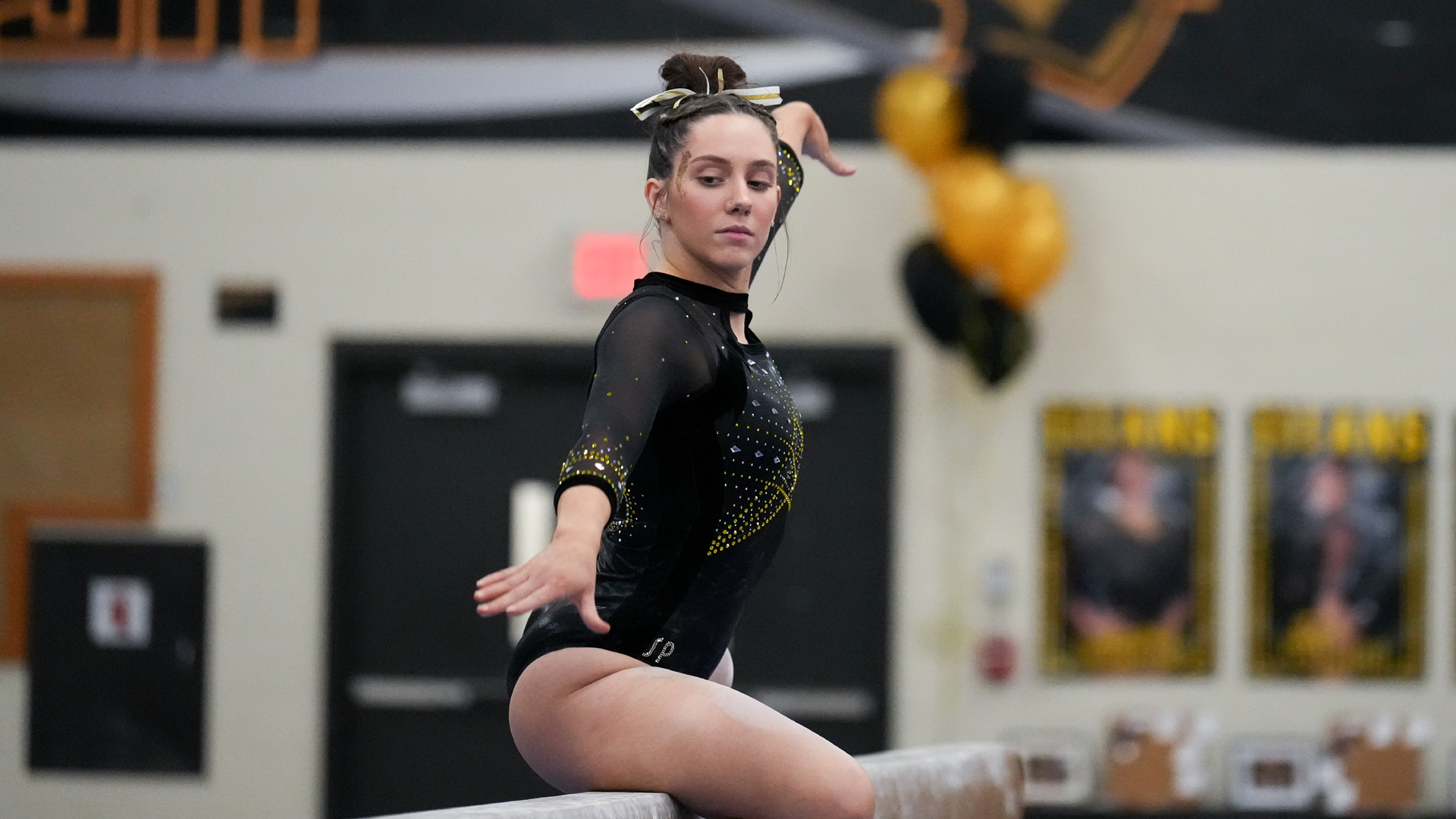 Emily Buffington set the program all-around record with 38.875 points in the Titans' win over the Warhawks on Friday. Photo Credit: Terri Cole, UW-Oshkosh Sports Information