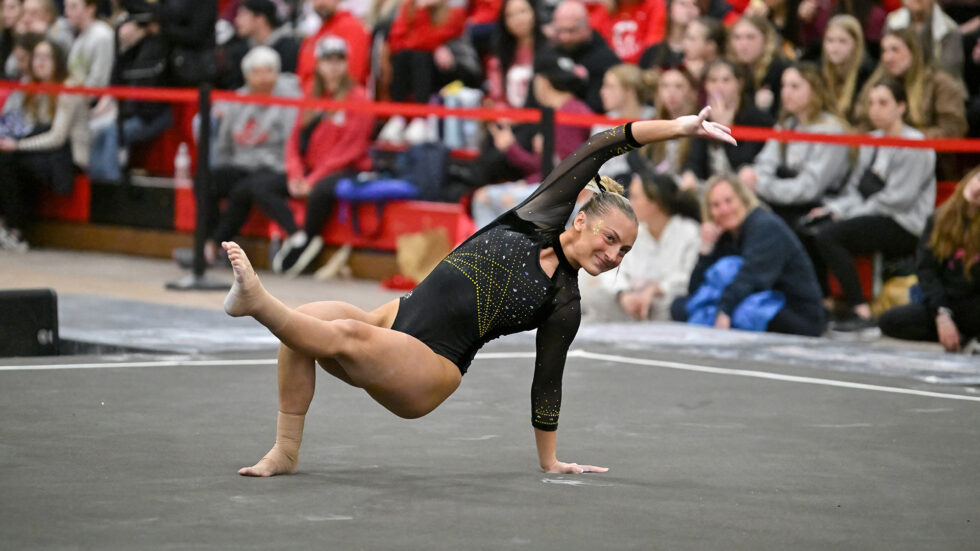 Aleah Radojevich shows her skill in floor exercise. Photo Credit: David Morgan, Stylish Images