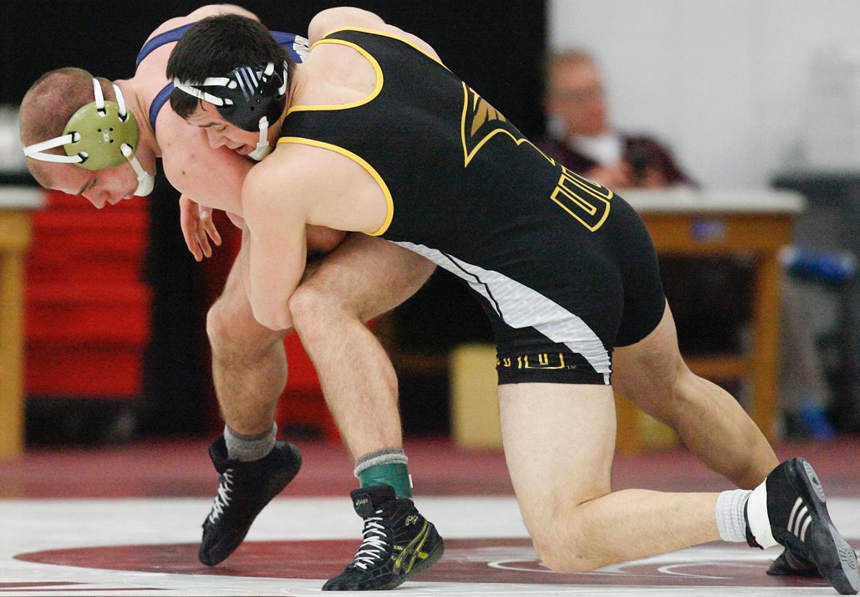 Korey Kleinhans placed fifth with a 2-2 regional record, including this 12-5 win over UW-Eau Claire's Matt Rieckhoff.