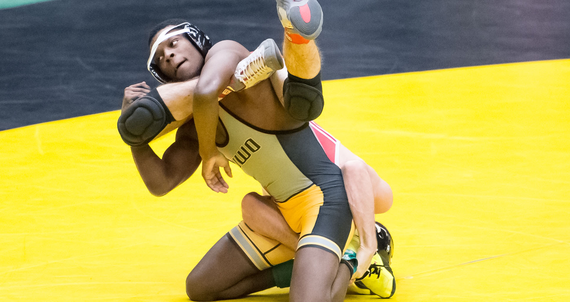 Jaylin Johnson's first collegiate victory was a pin over the Raiders' Mark Niewierowski in 2:35.