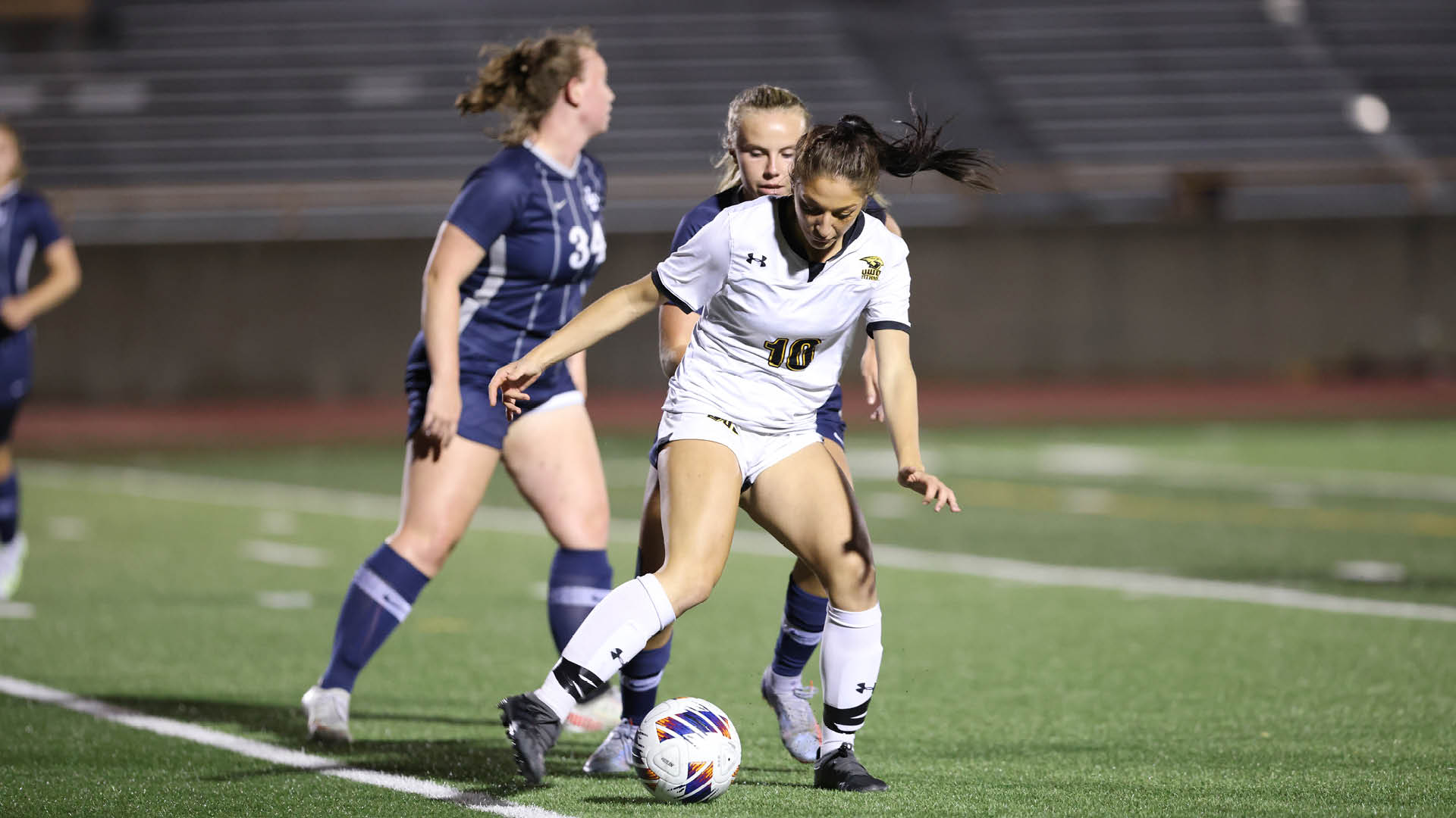 Alexia Poulos recorded an assist during the game against Stout. Poulos is picutred against Lawrence University