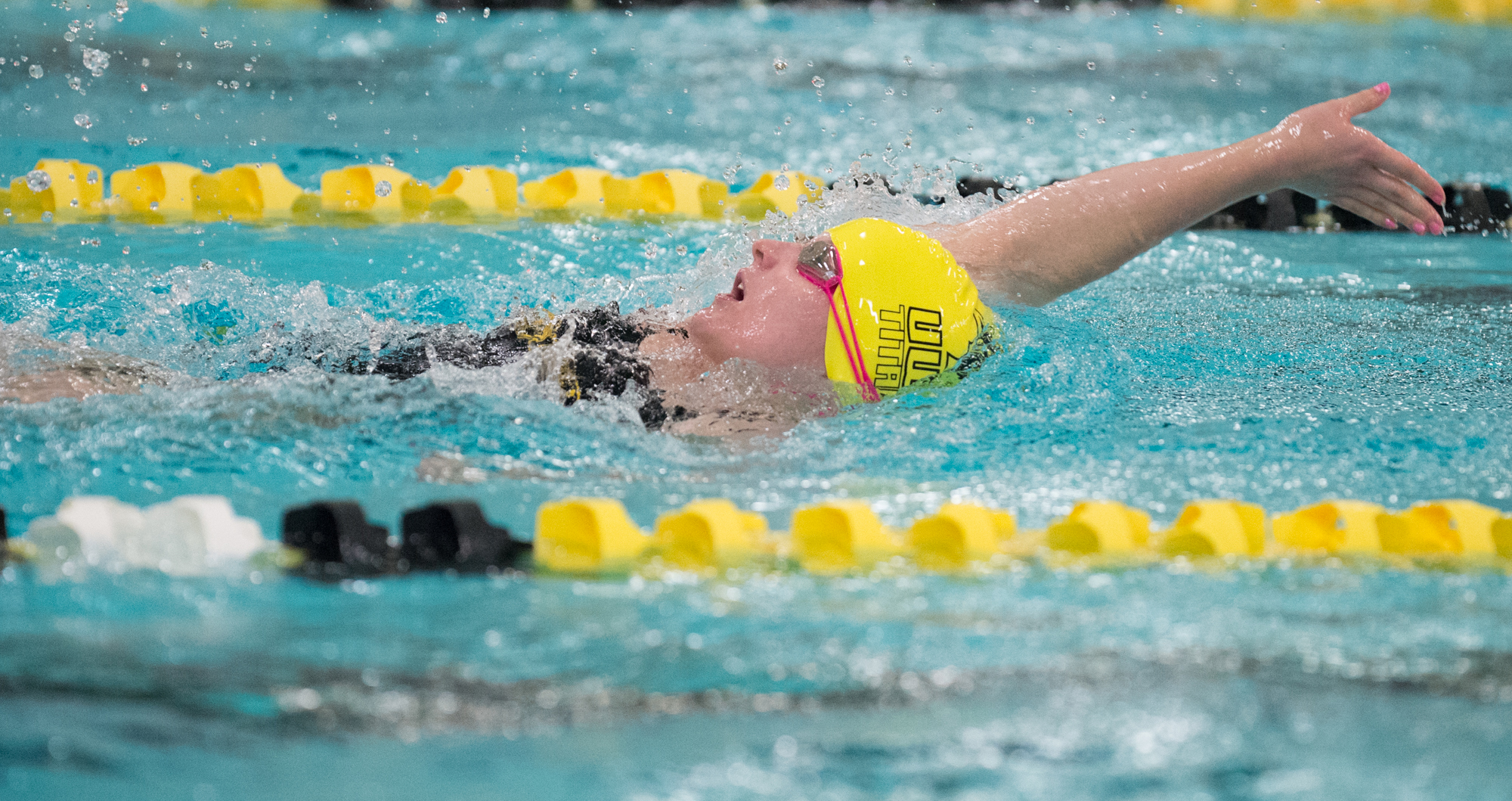 Katie Challoner won the 100-yard breaststroke while finishing fourth in the 200-yard individual medley.