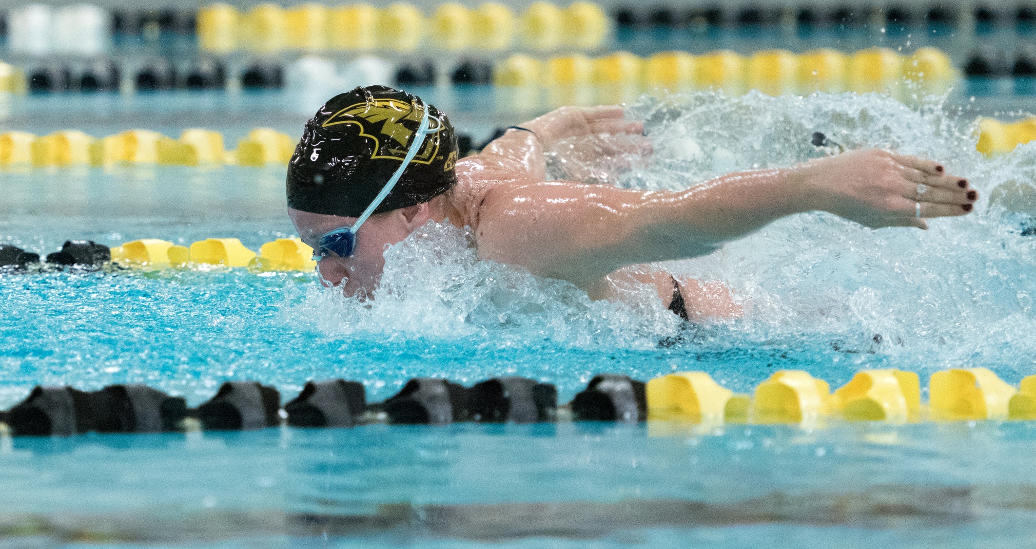 Taylor Teske swam to victories in the 50-yard freestyle and 100-yard backstroke against the Red Hawks.