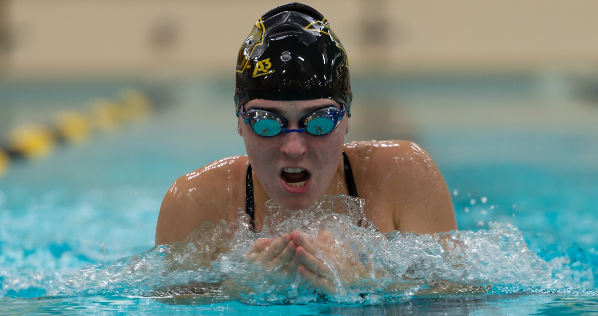 Challoner's Record-Breaking Swims Paces Titans At WIAC Championship