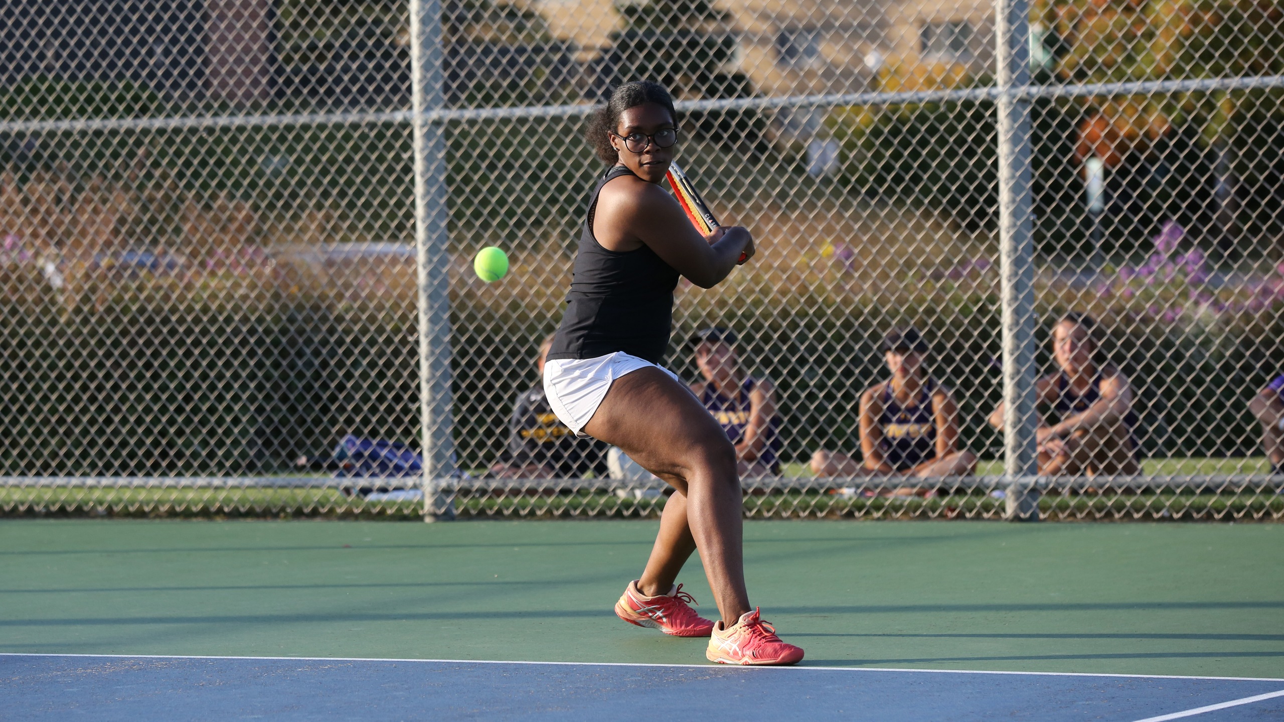 Michelle Spicer represented the Titans at both No. 1 singles and No. 1 doubles against the Blugolds.