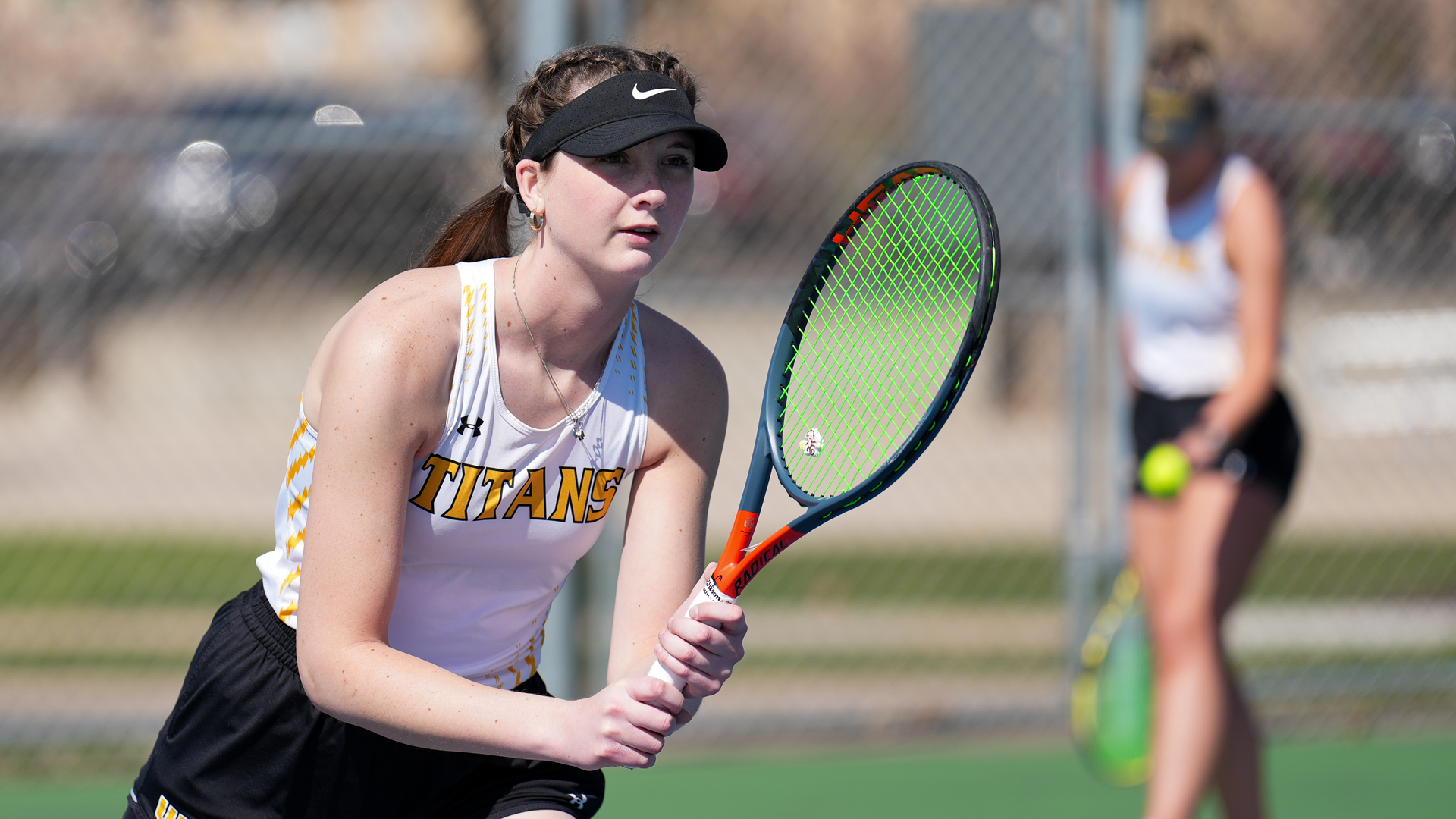 Kayla Gibbs (pictured) and No. 3 doubles partner Jameson Gregory won an 8-6 decision over their Viking opponents on Saturday. Photo Credit: Terri Cole, UW-Oshkosh Sports Information
