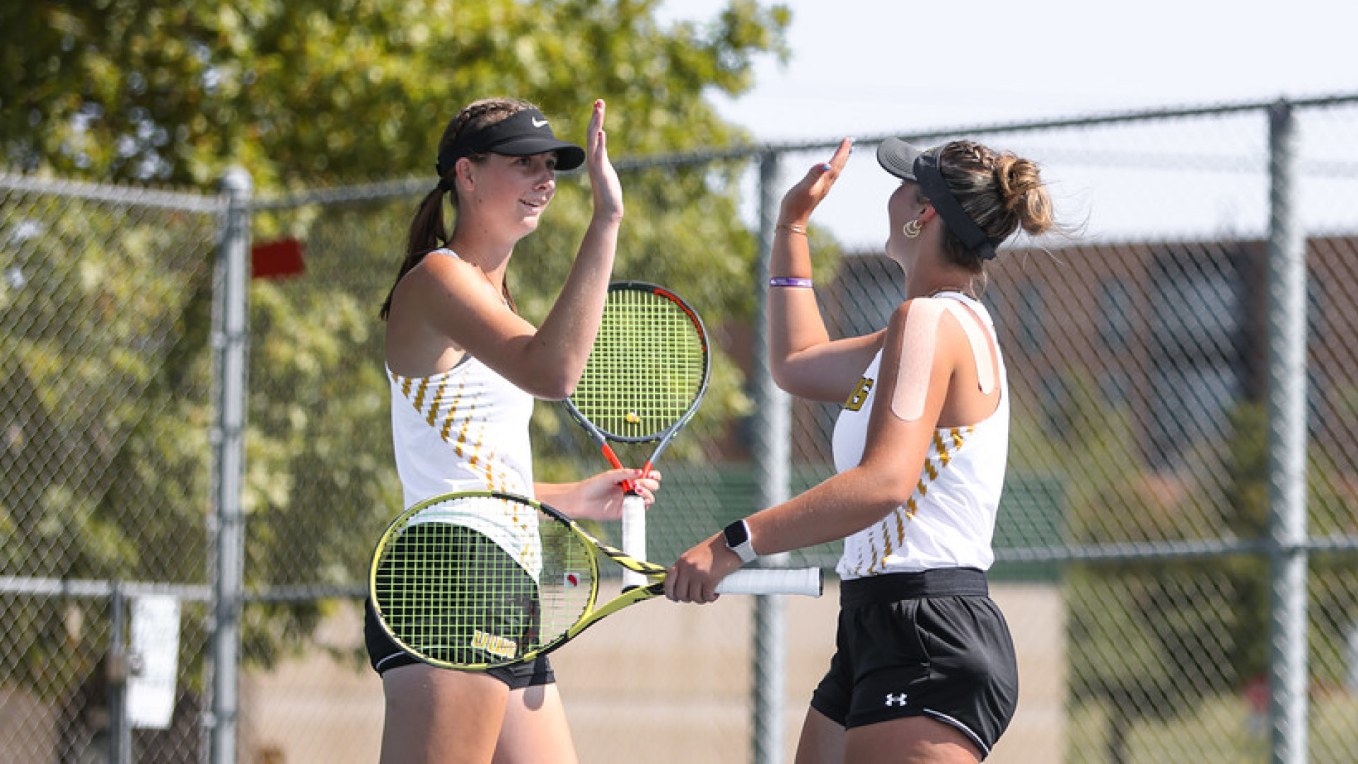 Kayla Gibbs and Jameson Gregory beat their Marian opponents 8-0 in the No. 3 doubles match on Wednesday