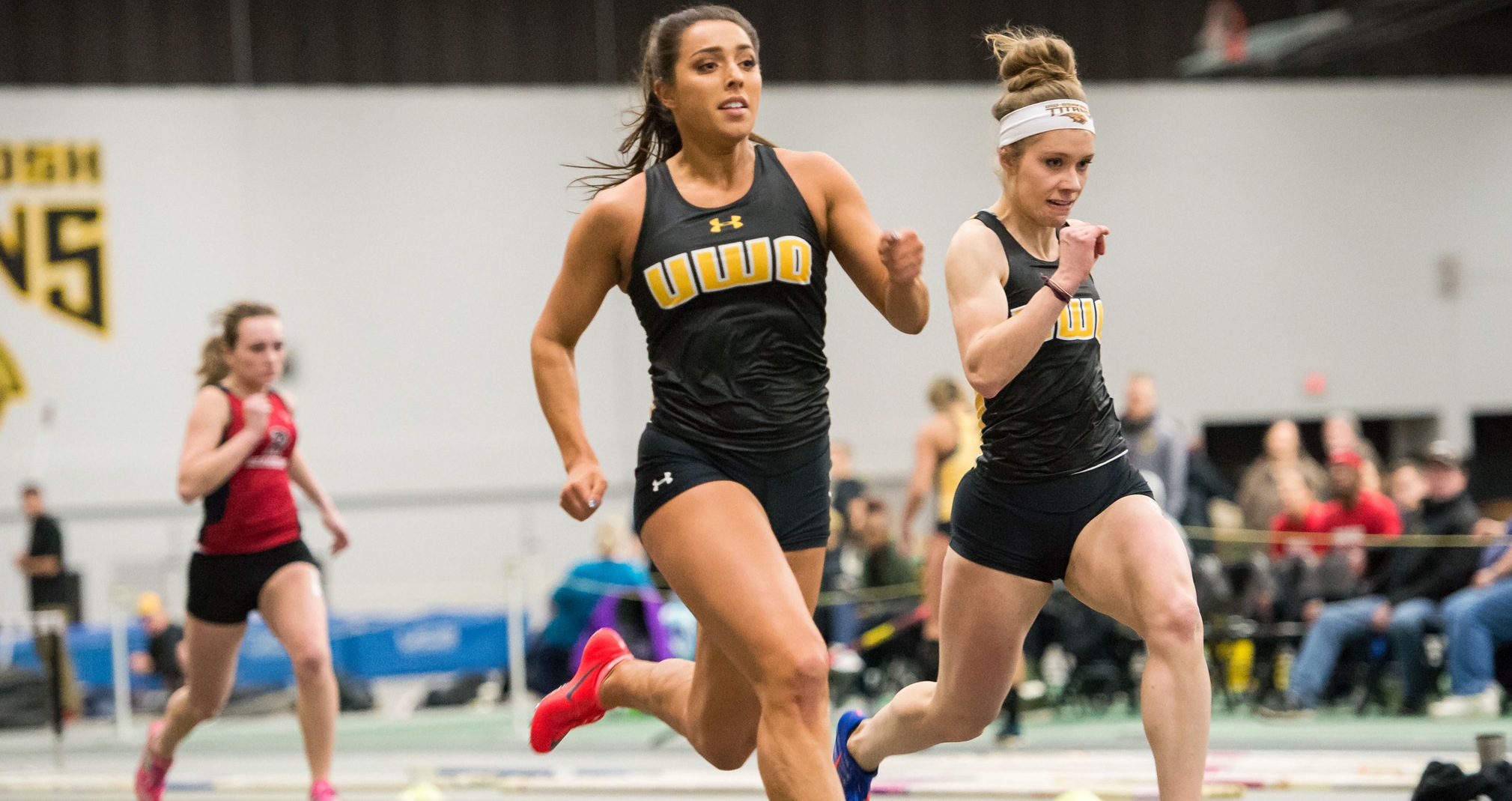Emily Reichenberger (left) ranks fourth in the 200-meter dash and 12th in the 60-meter dash on this season's national performance list.
