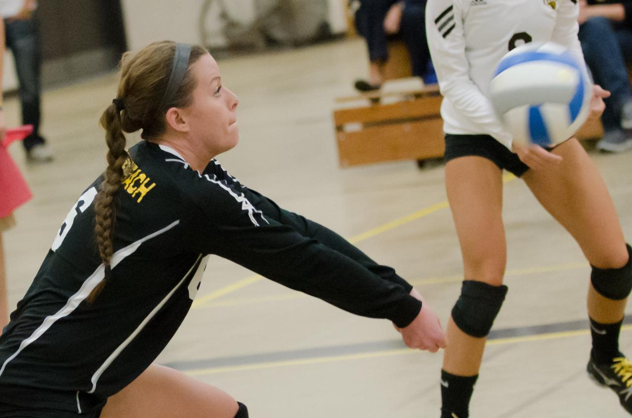 The Titans' Danielle Stoppenbach contributed eight digs