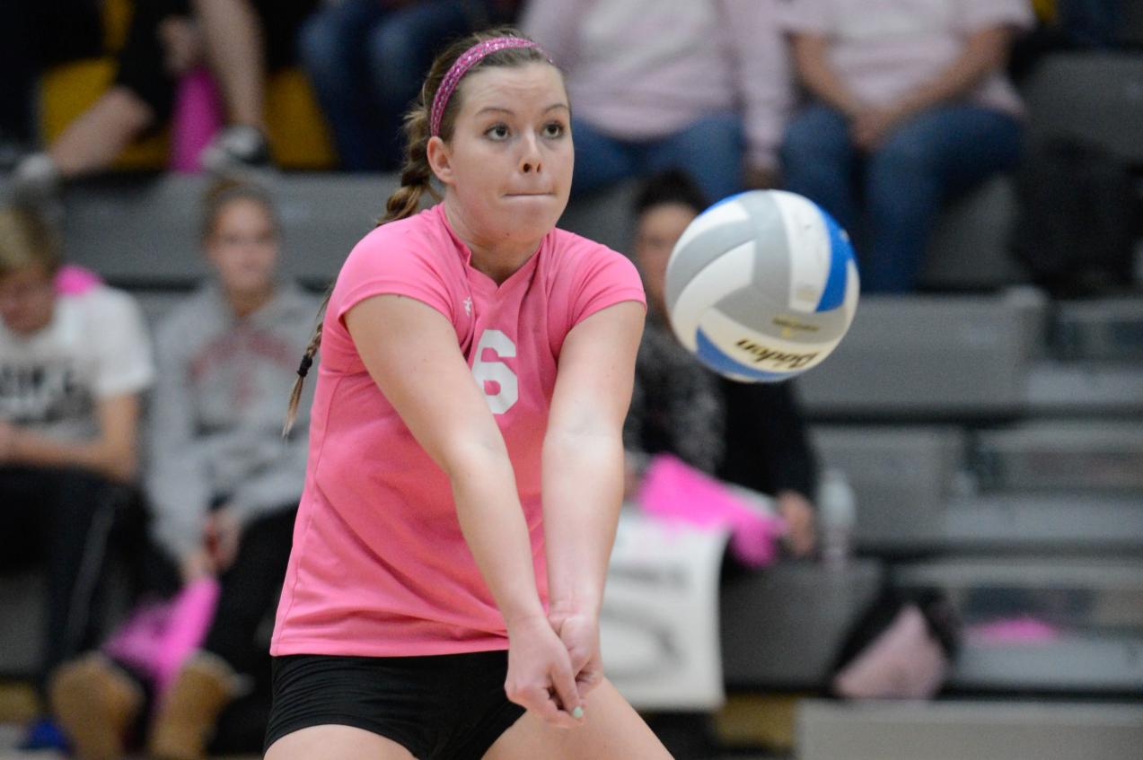 The Titans' Danielle Stoppenbach tallied eight digs and two service aces
