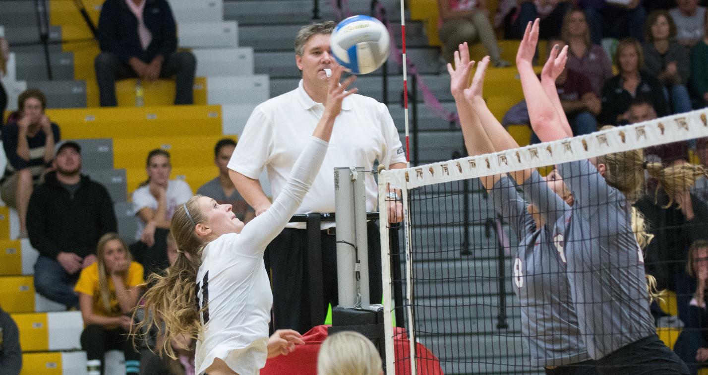Katelyn Malcheski hit .324 with 16 kills to help the Titans move into sole possession of the WIAC lead.