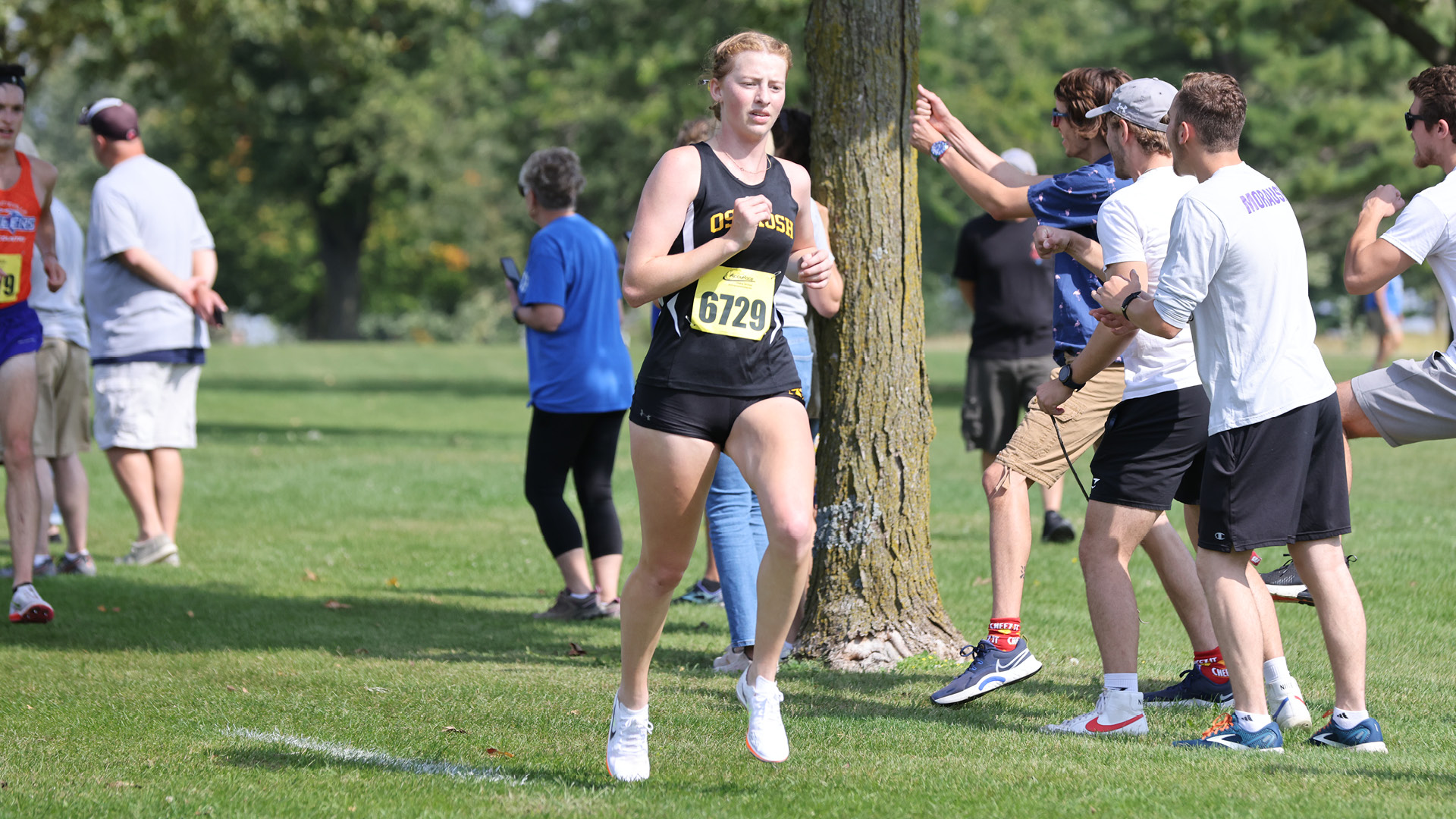 Madigan led the Titans with a 23:33, eighth place finish at the Blugold Invitational