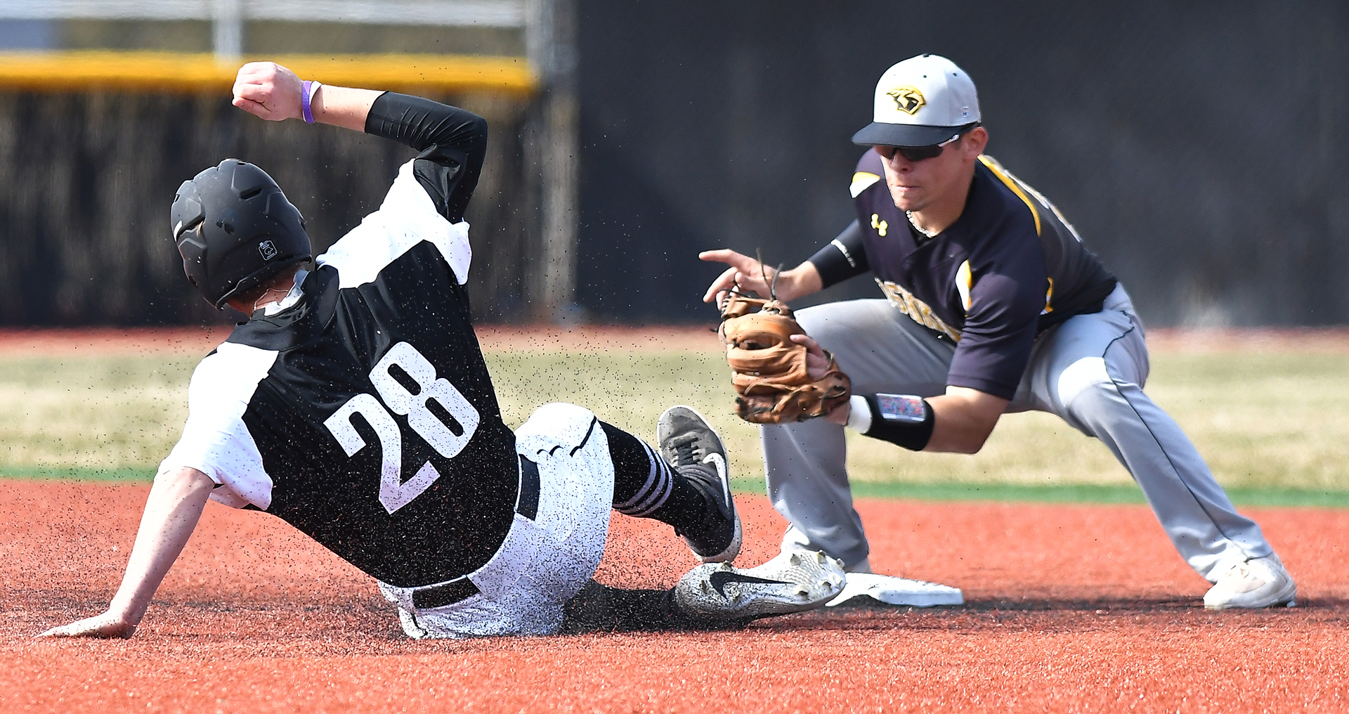 Dylan Ott places the tag on UW-Whitewater base stealer Alex Doud.