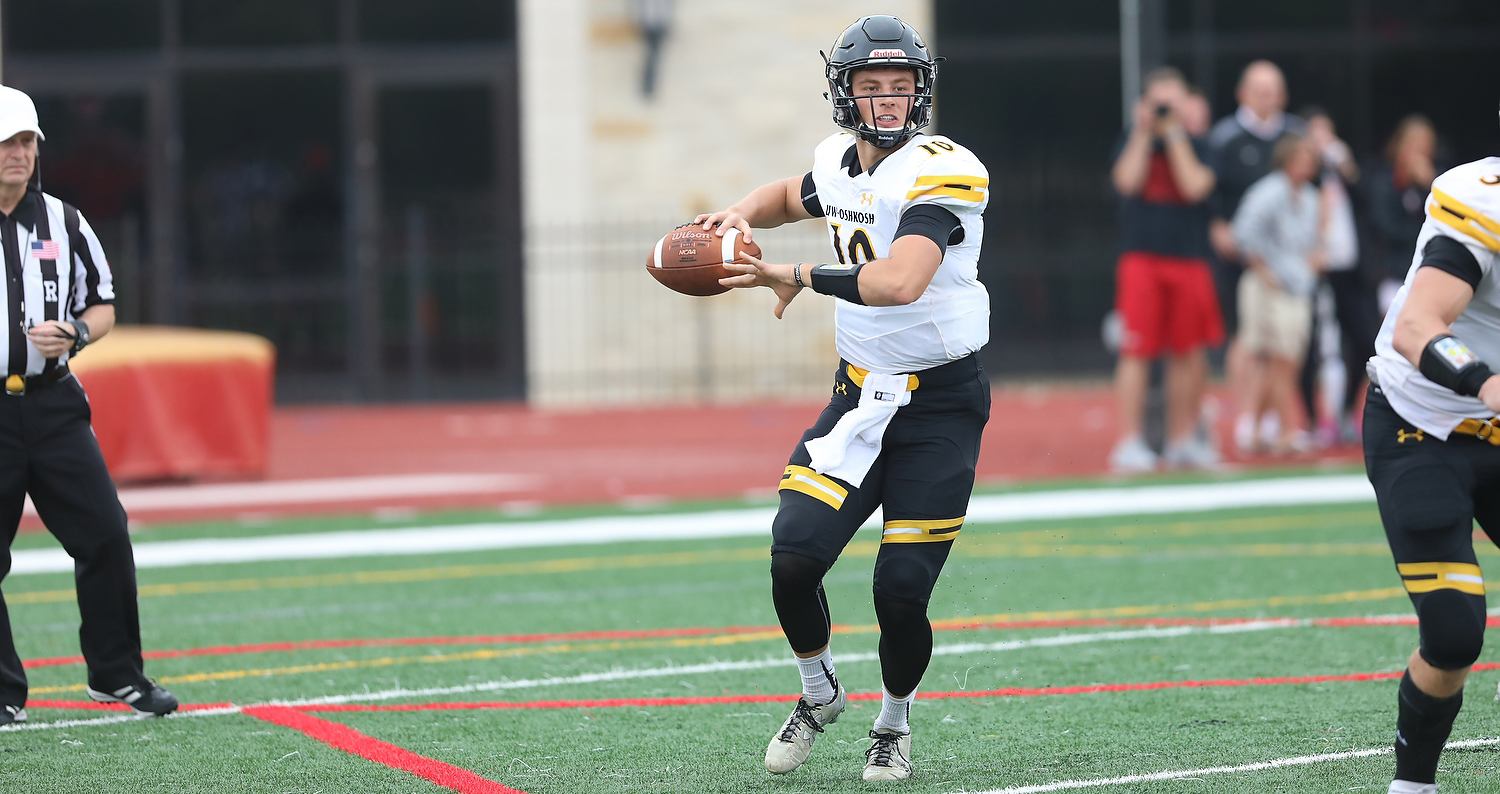 Kyle Radavich ran for a first-quarter touchdown and threw for a fourth-quarter score as the Titans defeated the Division II Blue Tigers.