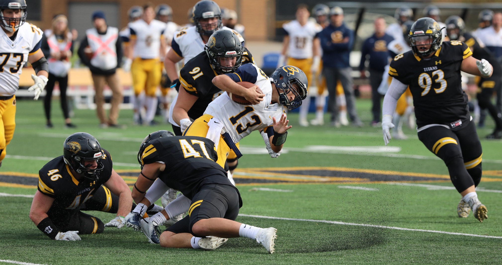 Tory Jandrin (47), Brandon Kolgen (91) and Trenton LaCombe (93) combined for 14 tackles and four of UW-Oshkosh's eight sacks against the Blugolds.