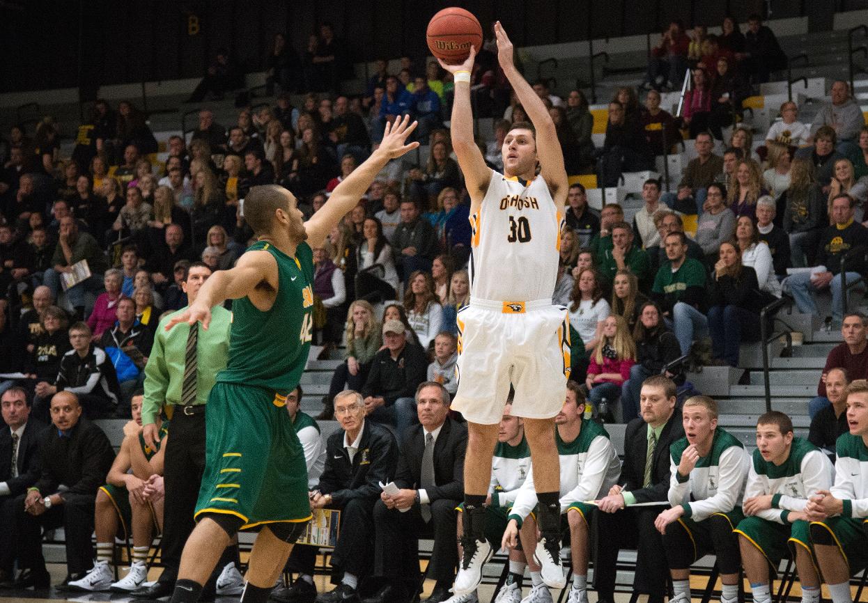 AJ Mueller scored a career-high 17 points and grabbed five rebounds against the Green Knights.
