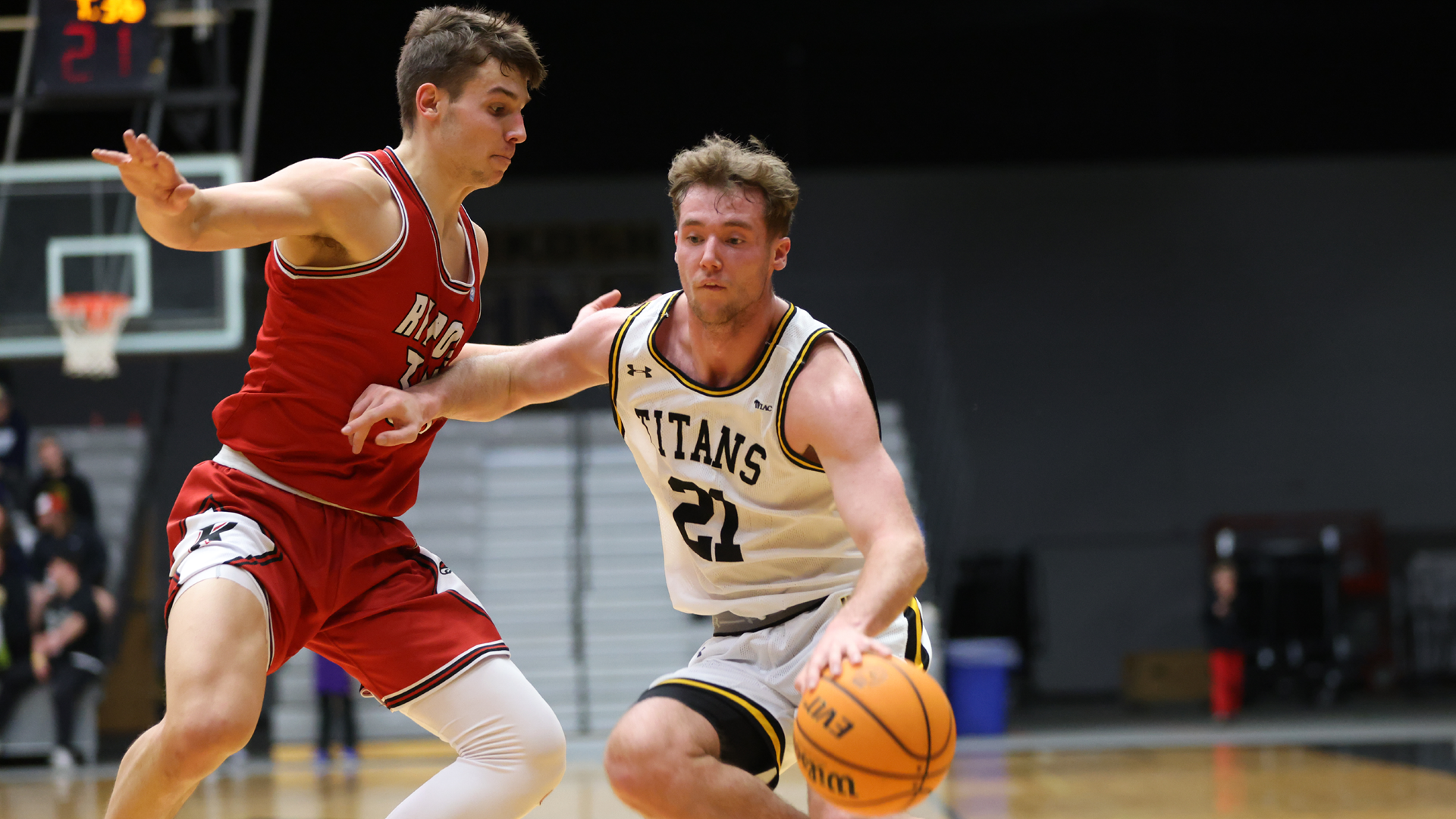 Carter Thomas scored a career-high 29 points in the Titans' 84-60 win over Ripon College on Monday