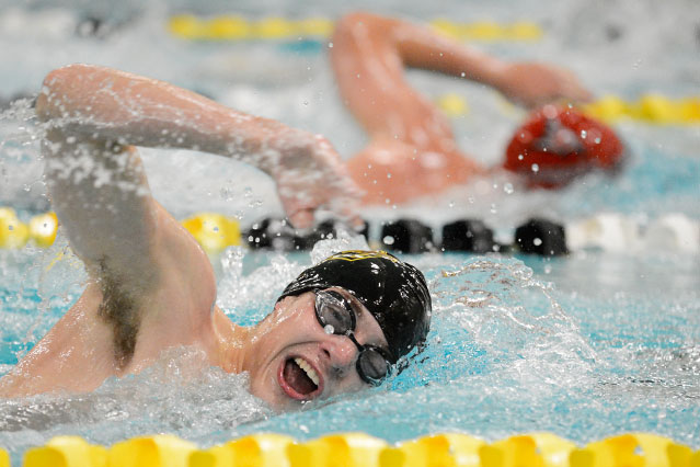 The Titans' Val Mikitchik competes in the 500-yard freestyle