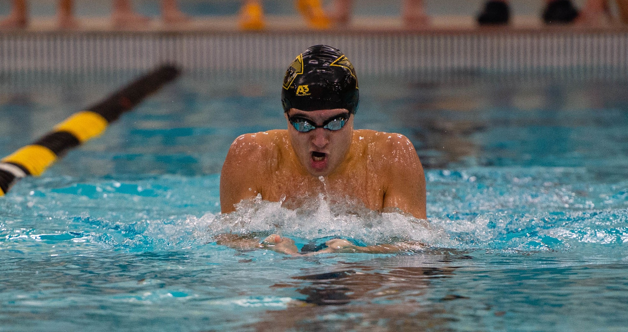 Josiah Vandenberg finished fourth in the 100-yard breaststroke against the Warhawks.