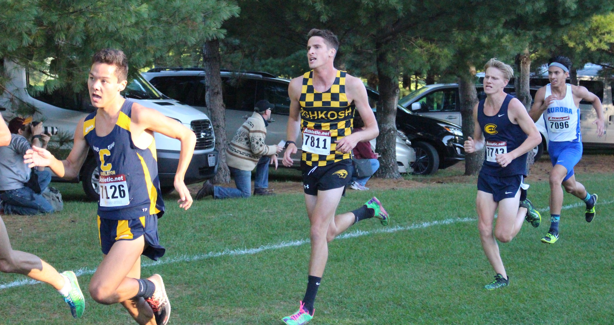 Justin Skinkis led the Titans by finishing 67th among meet's 438 runners.