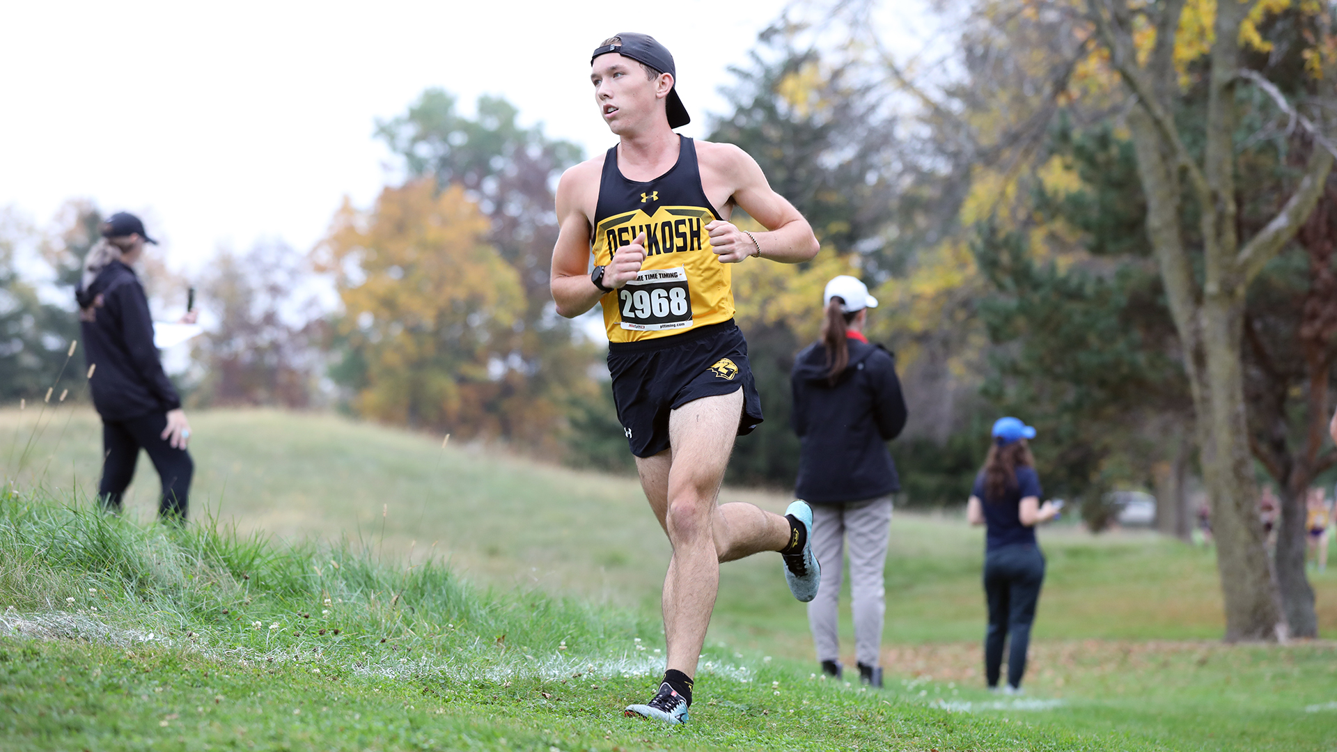 Cody Witthun's second-place run helped the Titans win the four-team UW-Whitewater Warhawk Open.
