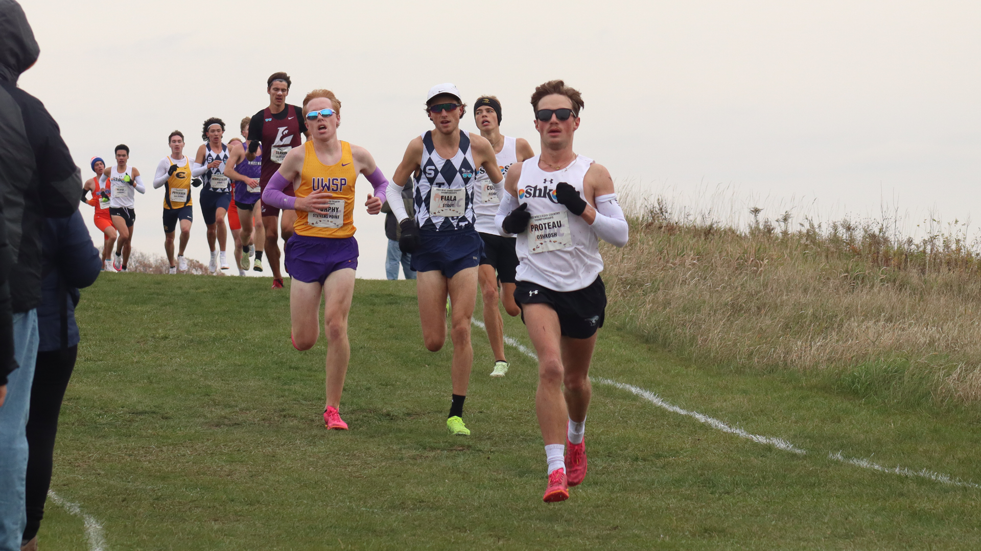 Paul Proteau led the Titans with a 25:35 finish for 21st place