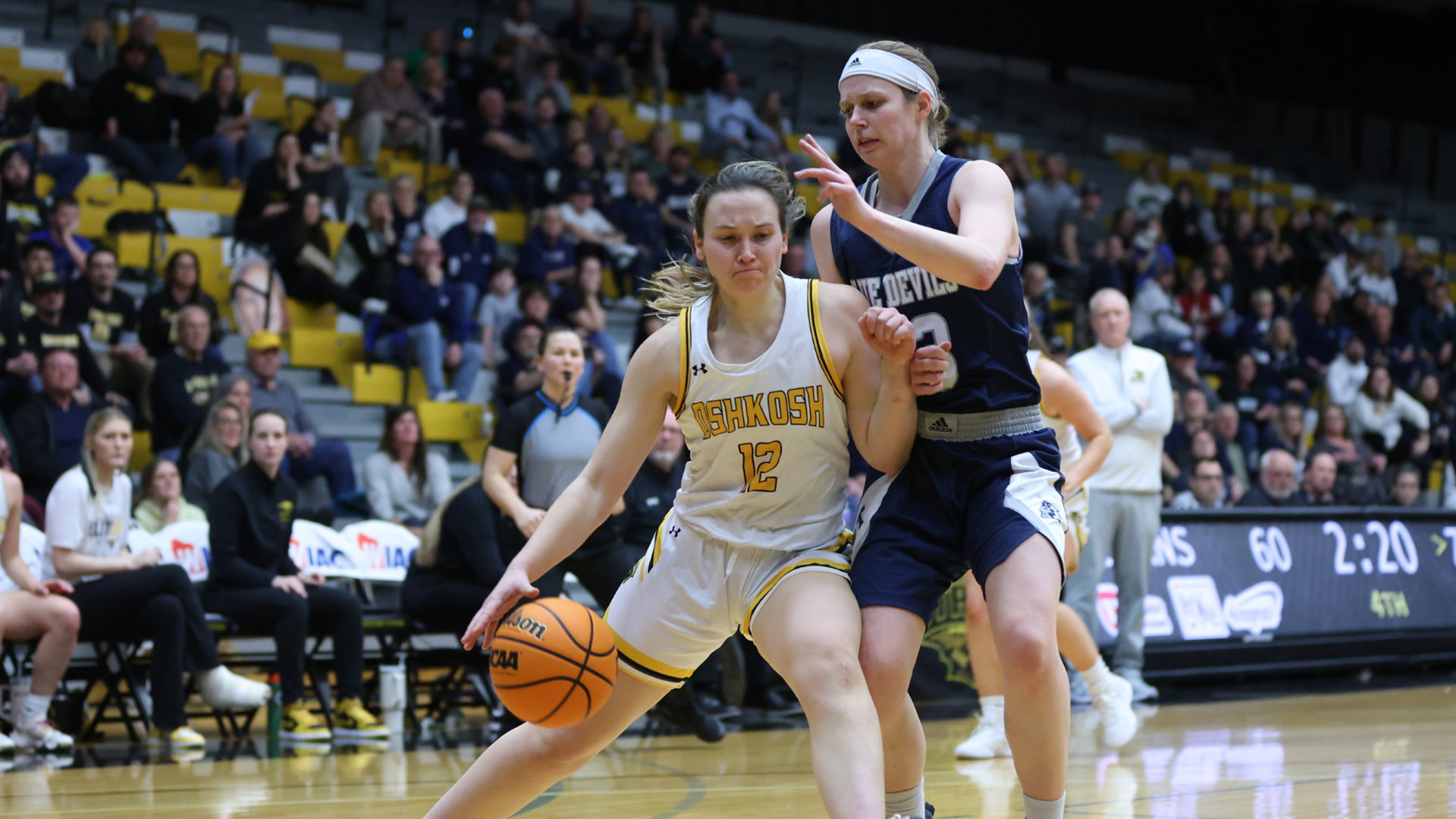 Bridget Froehlke led the Titans with 17 points in the WIAC Championship in Oshkosh on Friday. Photo Credit: Steve Frommell, UW-Oshkosh Sports Information