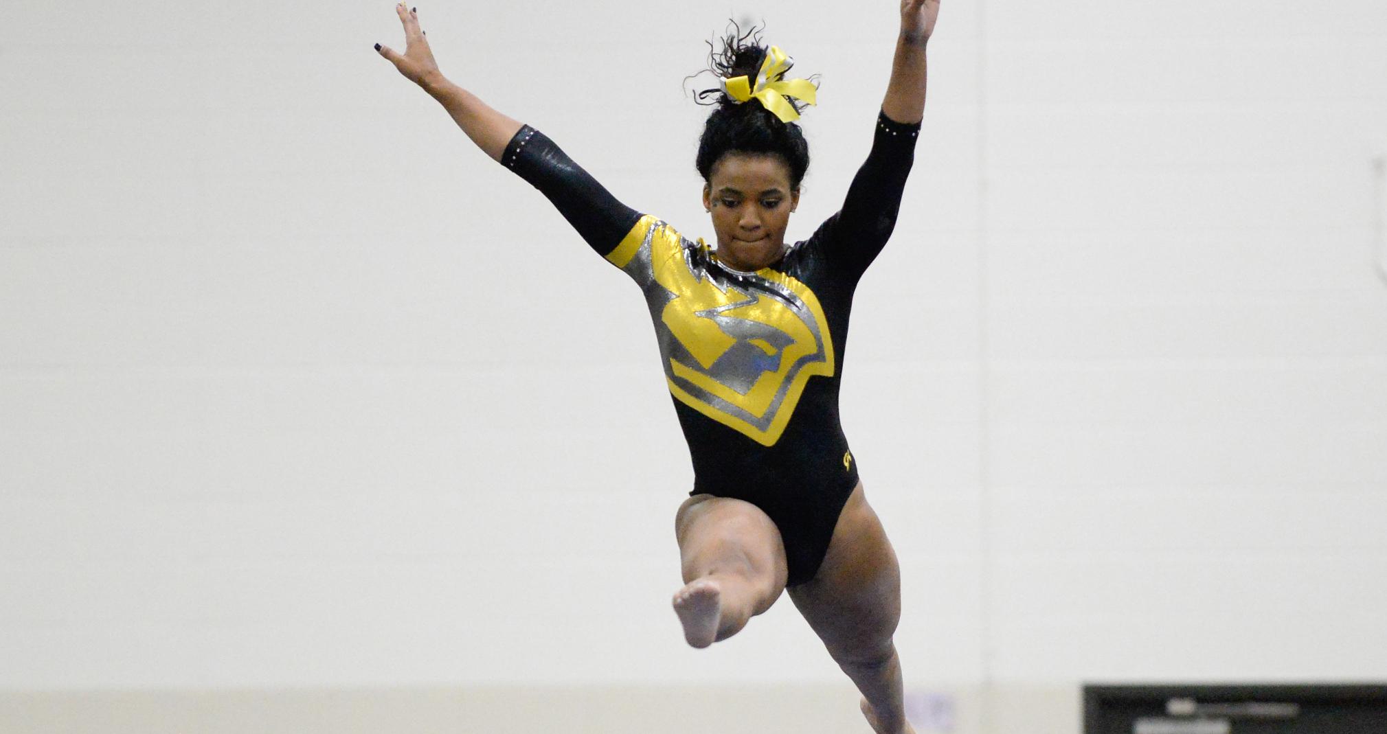 Krystal Walker took first place in three categories against the Gusties, including the balance beam competition.