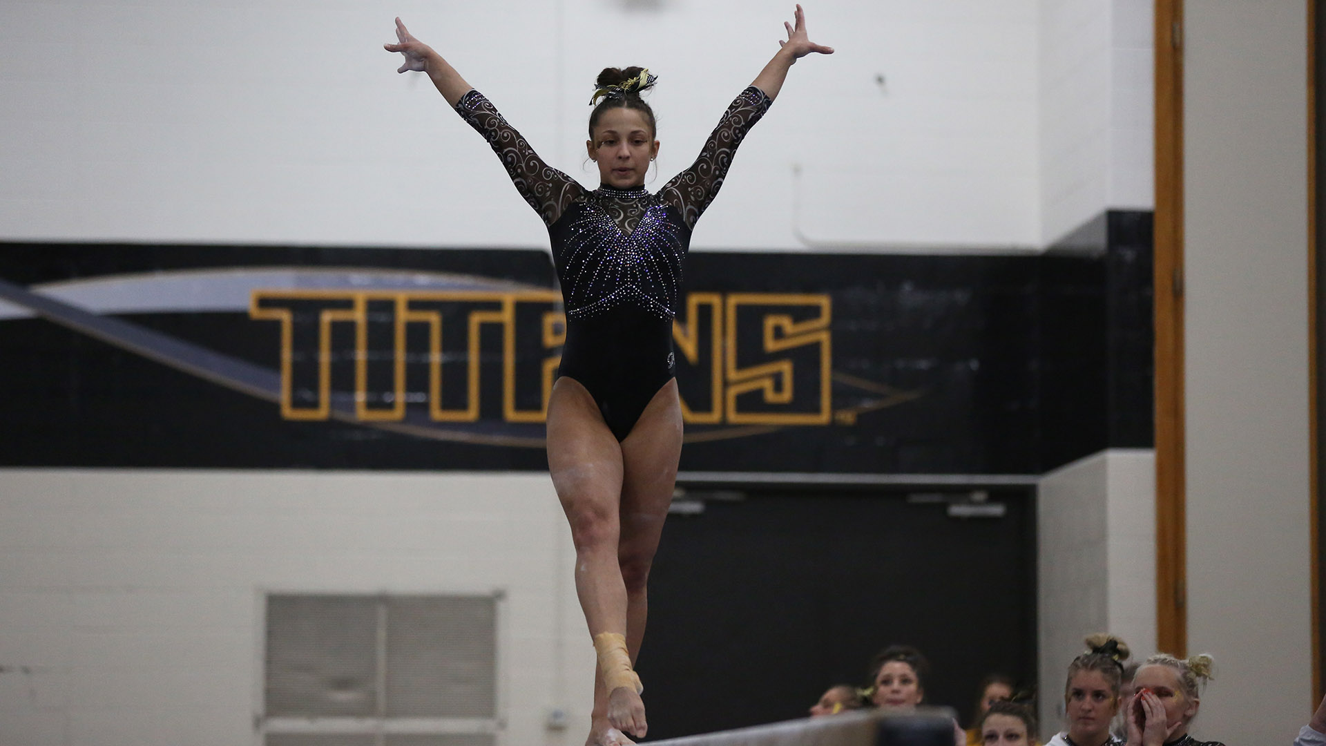 Olivia Keller earned first place finishes on the balance beam and in the floor exercise against the Warriors.