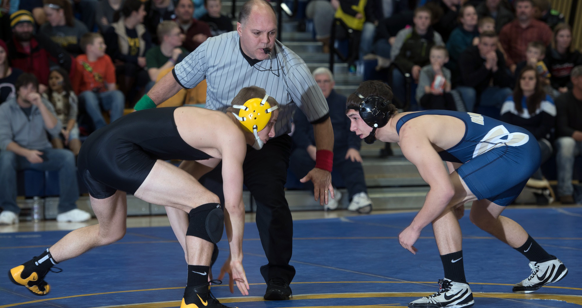 Late Pins Help Blugolds Defeat Titans