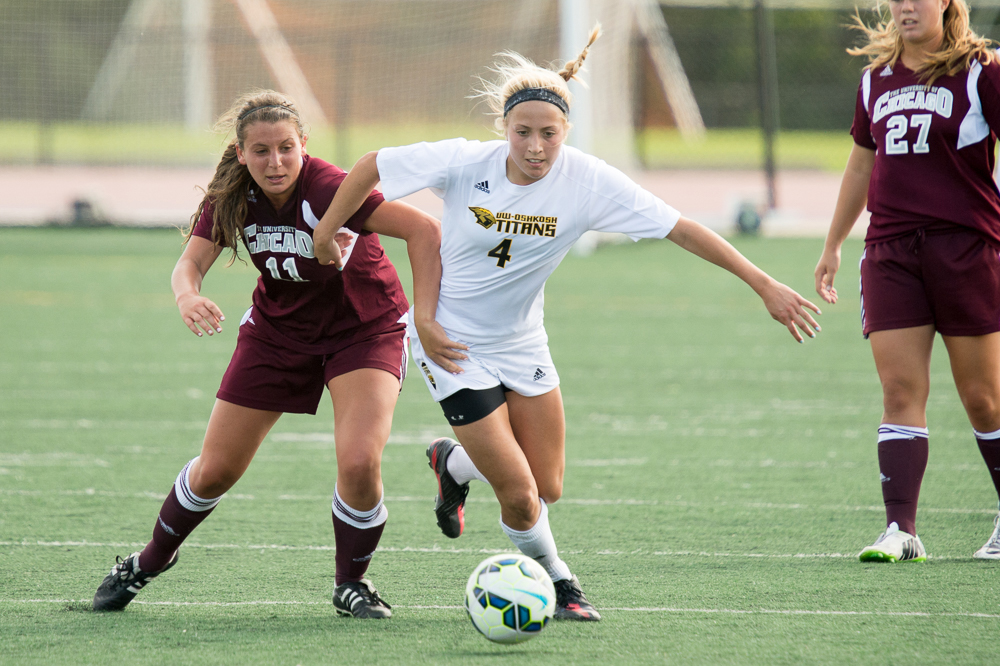 Robyn Elliott, who had a match-high three shots on goal, battles an University of Chicago player for possession of the ball.