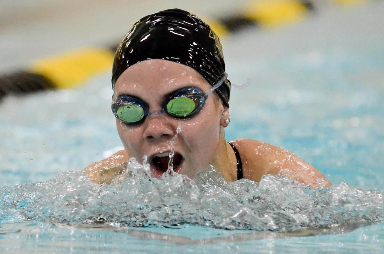 Titans Dominate Dual Meet With Pioneers