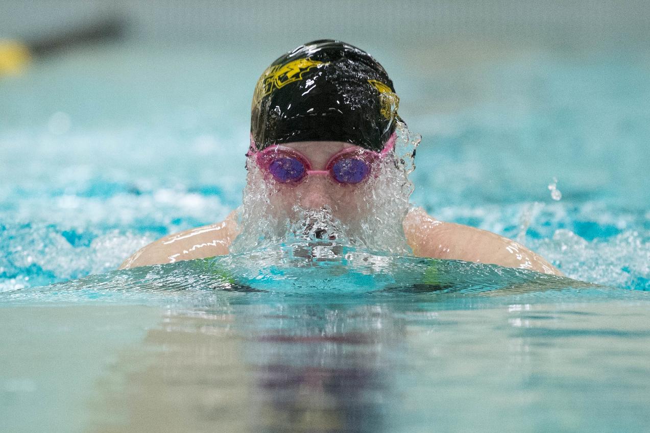 Katie Challoner won the 100-yard breaststroke and a relay.
