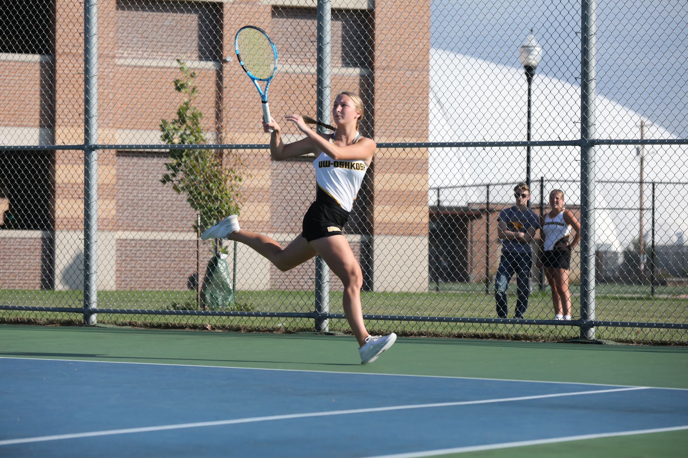 Jenna Nolde won her singles match and paired with Courtney Carpenter to win in doubles against St. Norbert College.