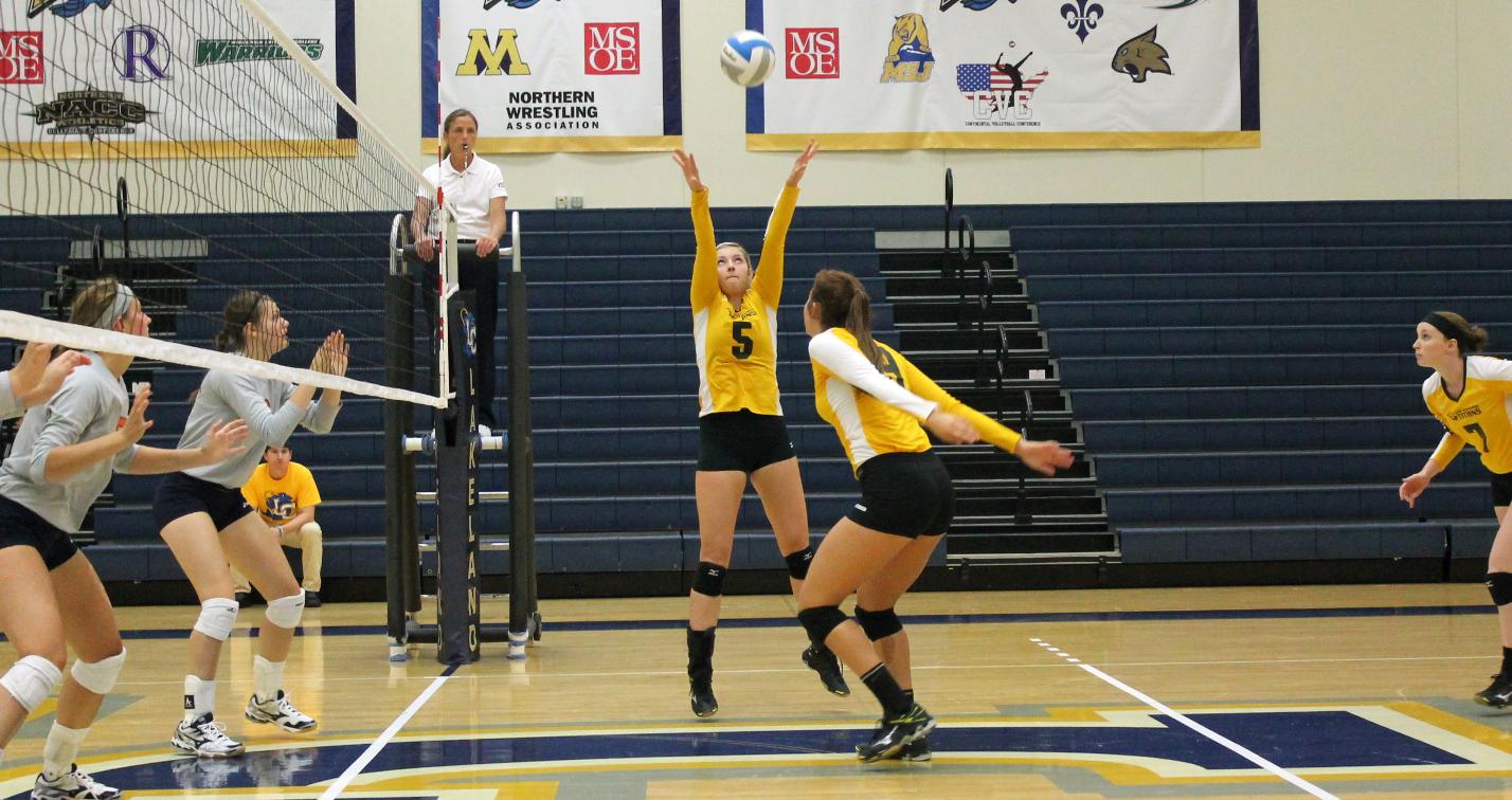 Lexi Thiel (5) recorded her 13th career double-double by totaling 30 assists and 17 digs against Lakeland College.