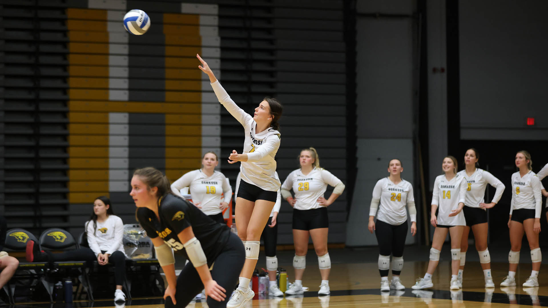 Kalli Mau had 56 total assists to help the Titans to two victories Tuesday in Illinois.