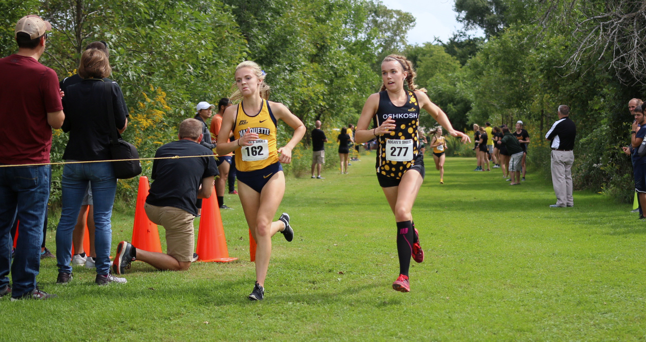 Evlyn Noone (right) finished seventh in her first collegiate race.