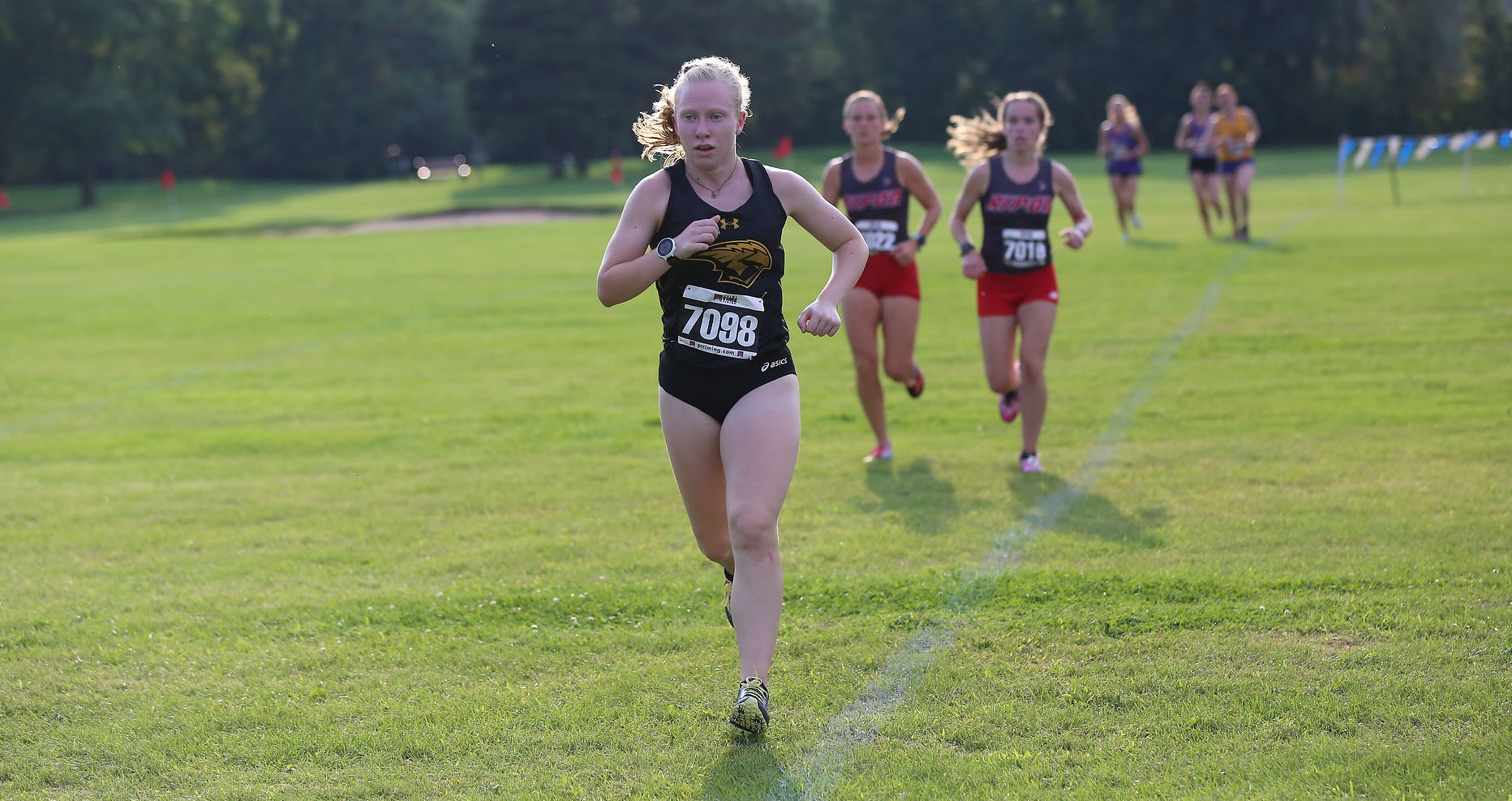 Lauren Urban placed second out of 32 runners to help the Titans win the UW-Oshkosh Open title.